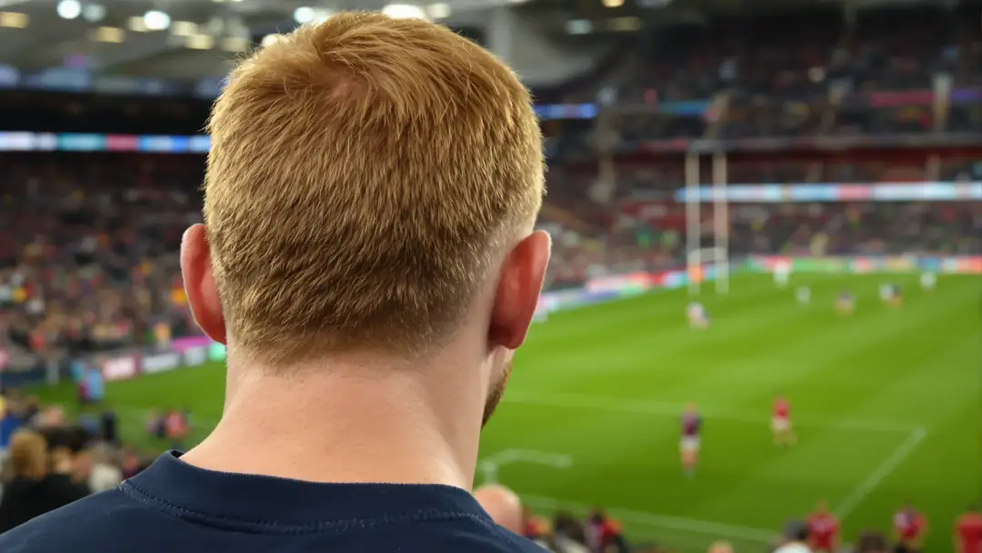 Illustrative photograph of a rugby player on the pitch